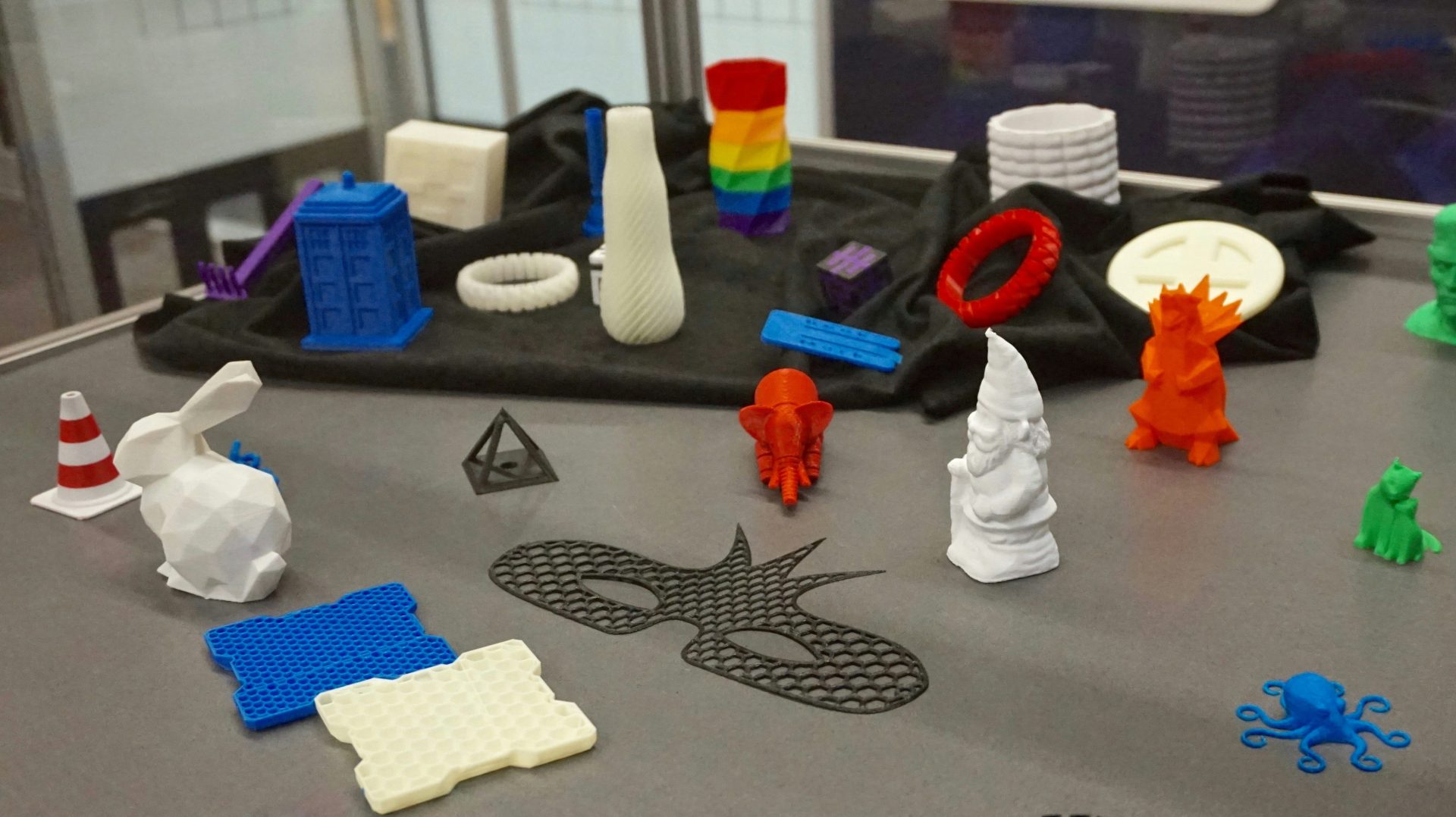 a table topped with lots of plastic toys